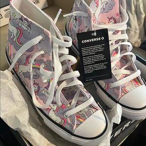 Converse Pink and White High-Top Sneakers with Artistic Design